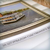 Разработка дизайна брошюры для Хаусбота - дома на воде